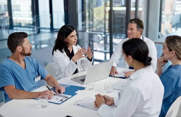 shot of a group of doctors having a meeting in a modern hospital