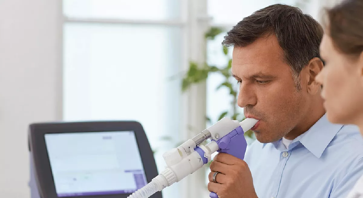 Patient undergoing advanced pulmonary function testing PFT and DLCO for lung capacity assessment