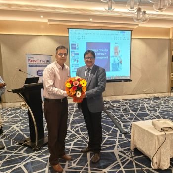 Pulmonologist receiving appreciation at medical conference for excellence in respiratory care